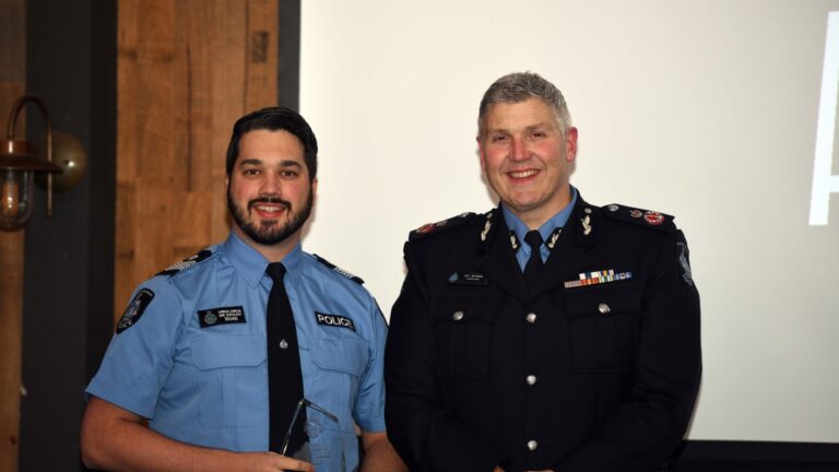 Senior Sergeant Cameron Johnson and Commissioner Col Blanch APM